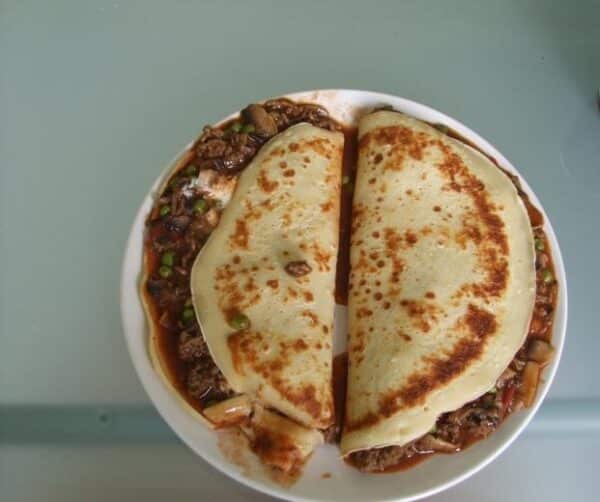 Flammkuchenrolle,Blätterteig mit pikanter Füllung - 99 rezepte