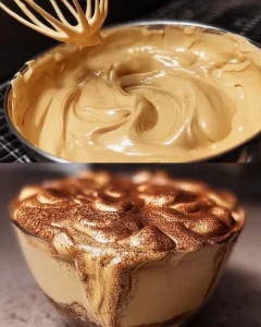 Cappuccino-Creme in einer Tasse mit Milchschaum und Kaffeebohnen